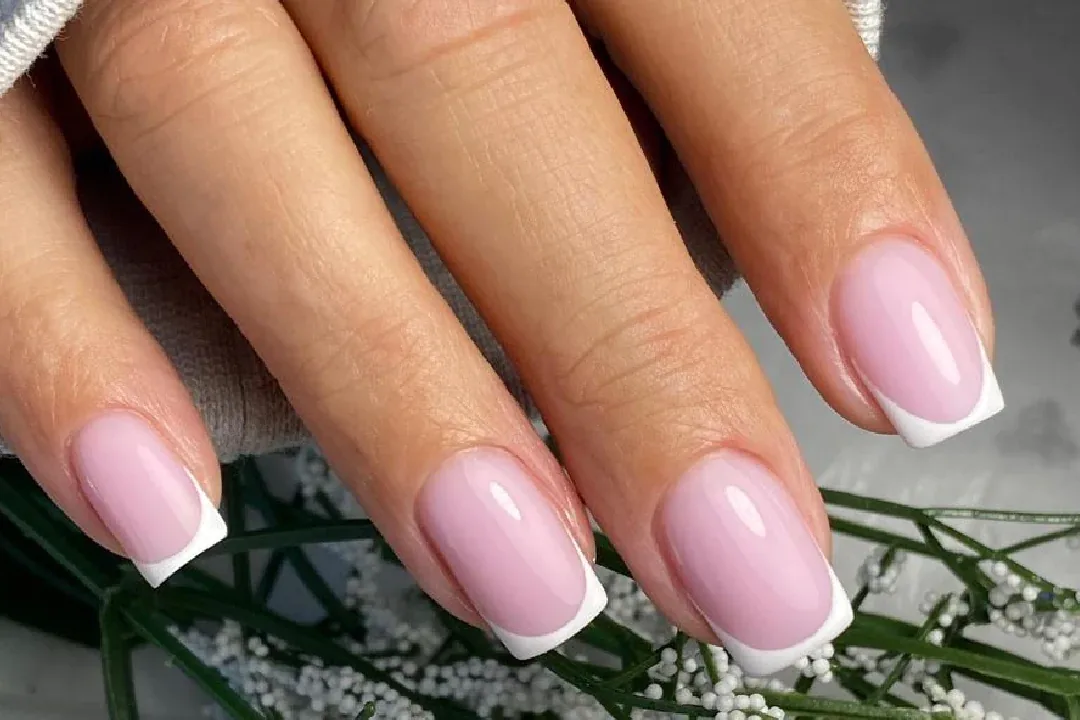 Soft pink French manicure on natural nails