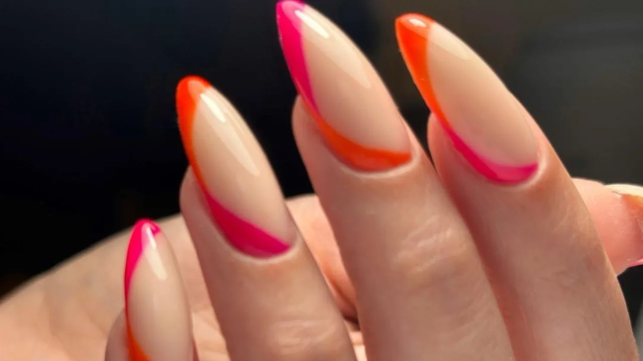 Nude nails with pink and orange French tips