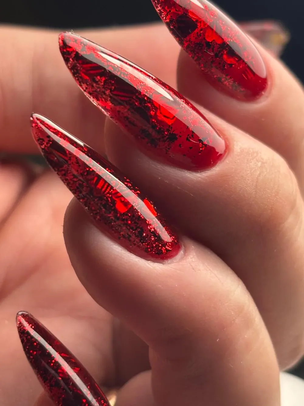 Red glitter stiletto nails