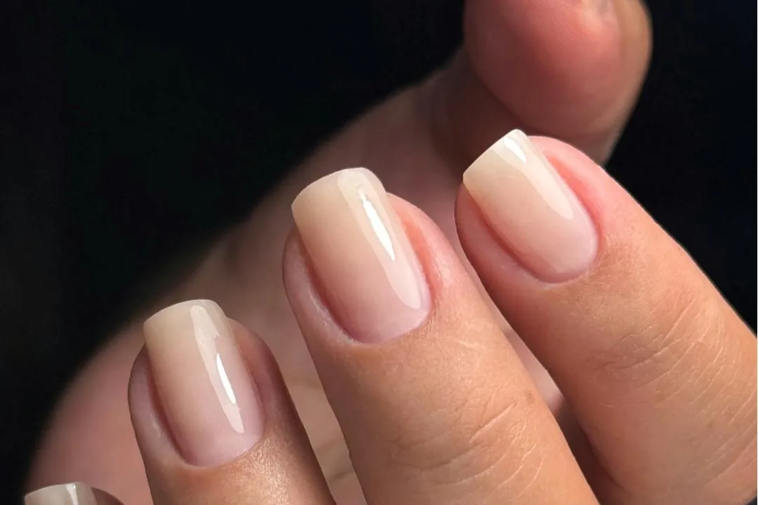 Clean, healthy natural nails in a soft square shape